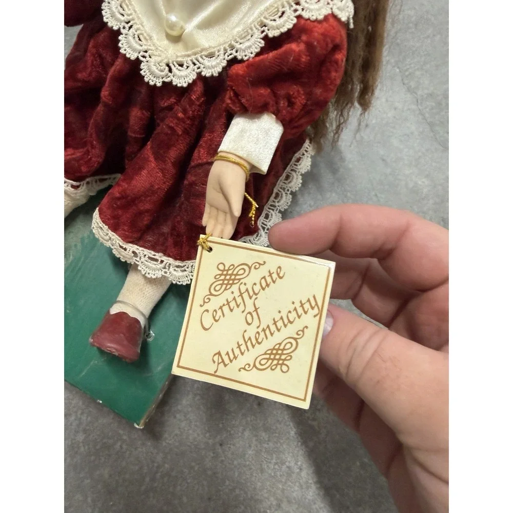 Dan Dee fine bisque porcelain animated wind-up musical doll, red‎ dress